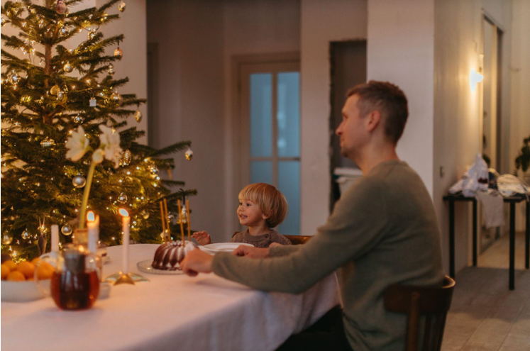 The Perfect Christmas Tree with Lights and Star Topper for Your Company Dinner